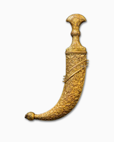 Daga de acero con repujado dorado en cobre.